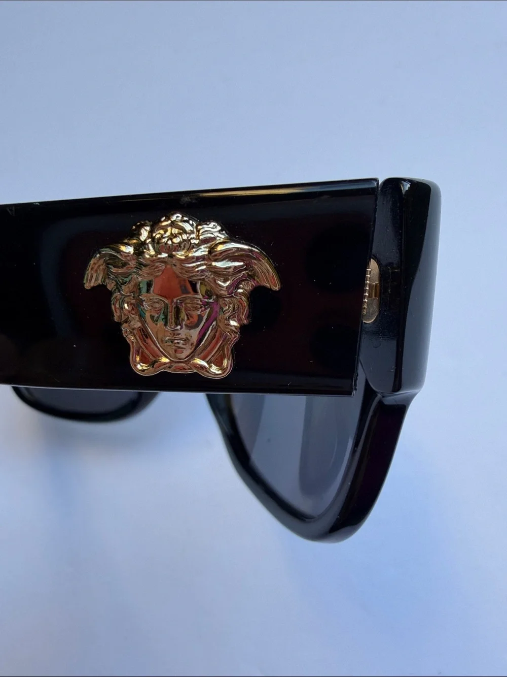 Versace questions leave